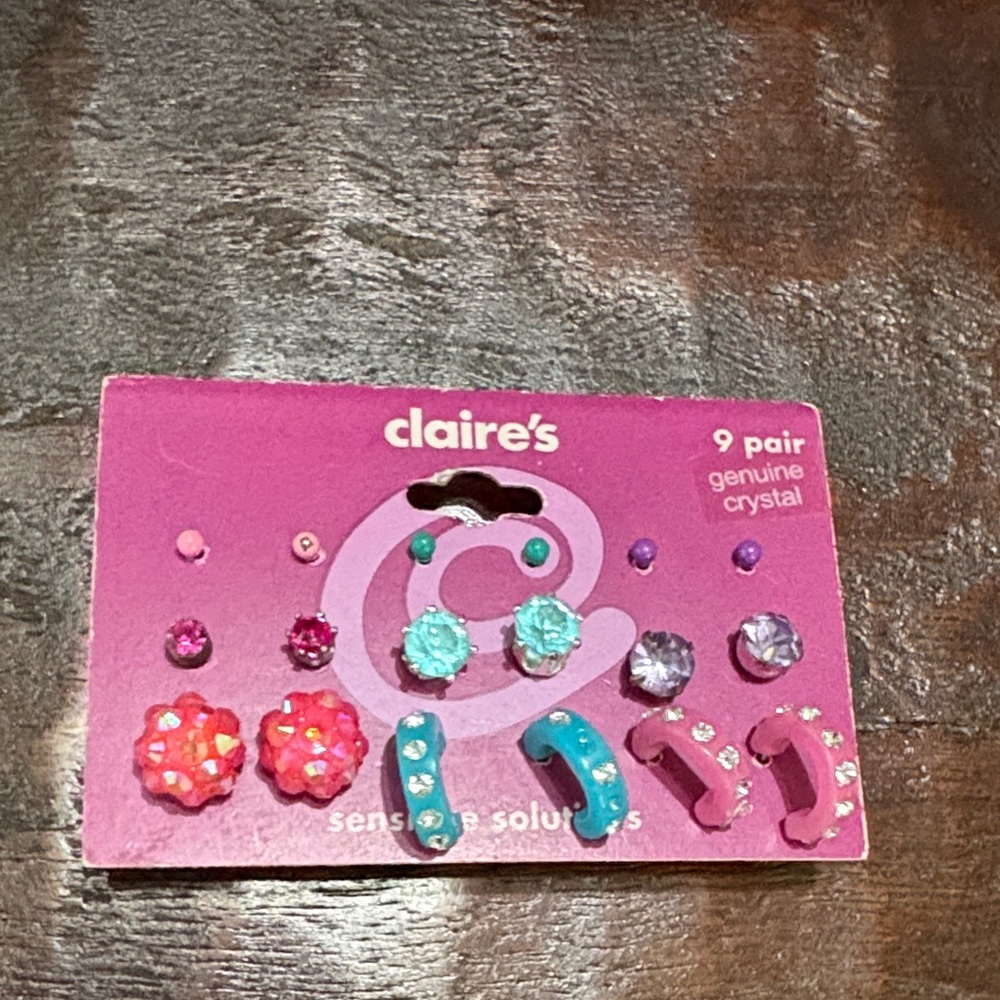 Claire’s 9 pair of pink, purple and blue pierced earrings sets